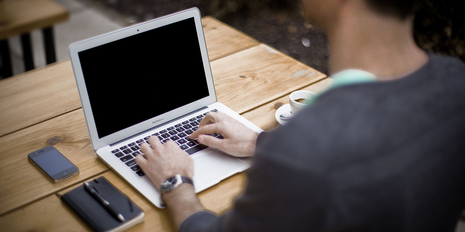 Person typing on a laptop